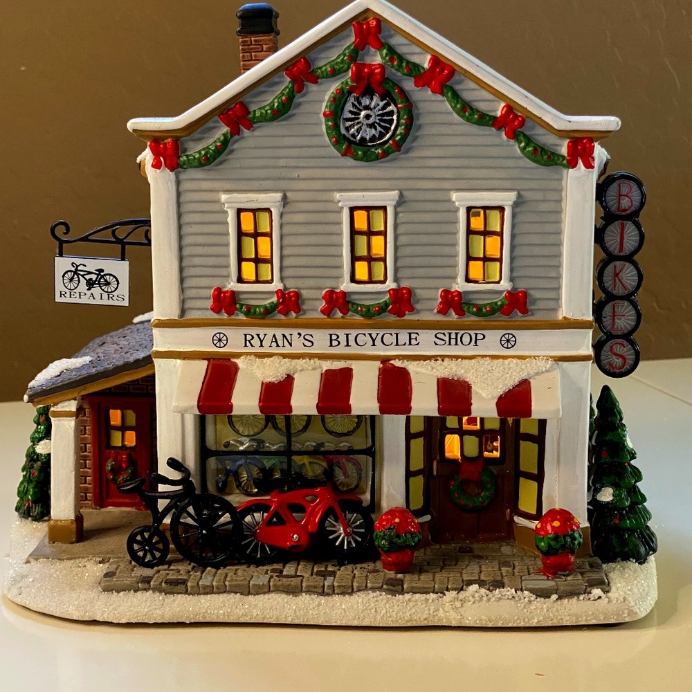 St Nicholas Square Village Collection  Illuminate Ryan's Bicycle Shop